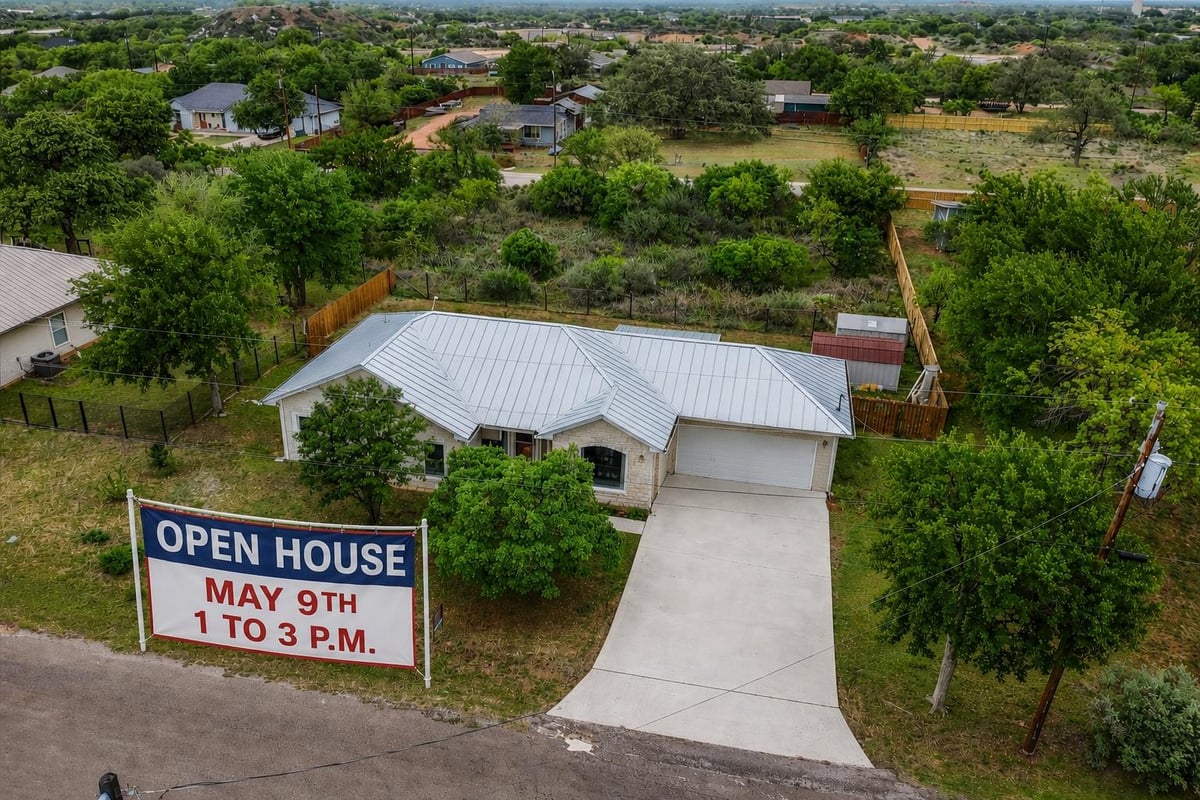 View 128 W PERSIMMON Dr in Live Oak 128 W PERSIMMON Dr - front exterior - Luxury home in Live Oak, Granite Shoals, TX