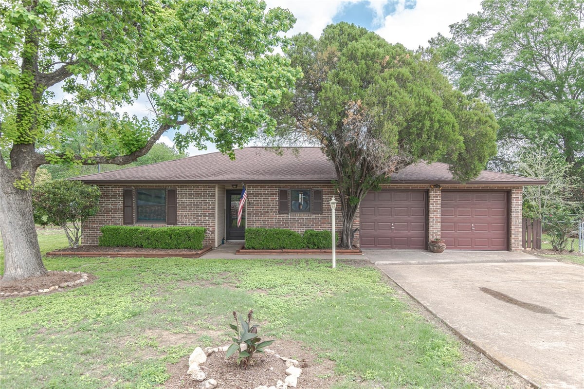 View 12805 Bob Johnson Ln in Bear Creek Park 12805 Bob Johnson Ln - property photo 1 - Luxury home in Bear Creek Park, Manchaca, TX