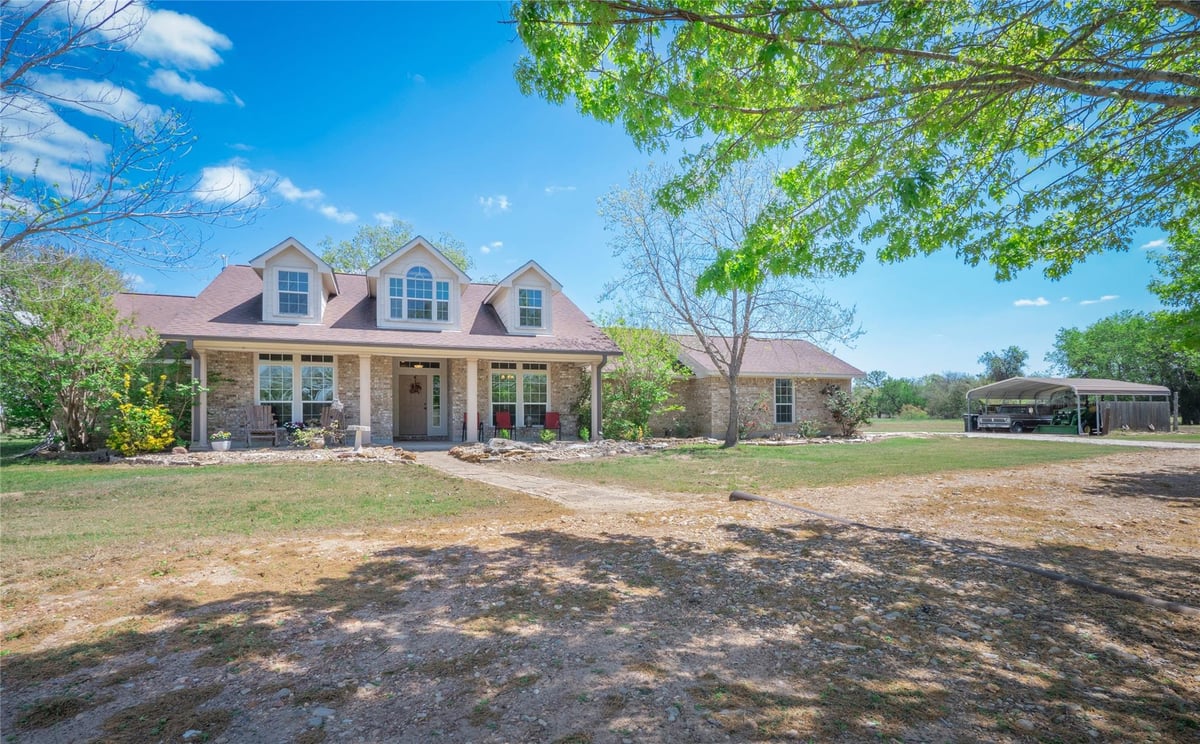View 1281 Private Road 7037 in Fedor Estates Sec 3 1281 Private Road 7037 - front exterior - Luxury home in Fedor Estates Sec 3, Lexington, TX