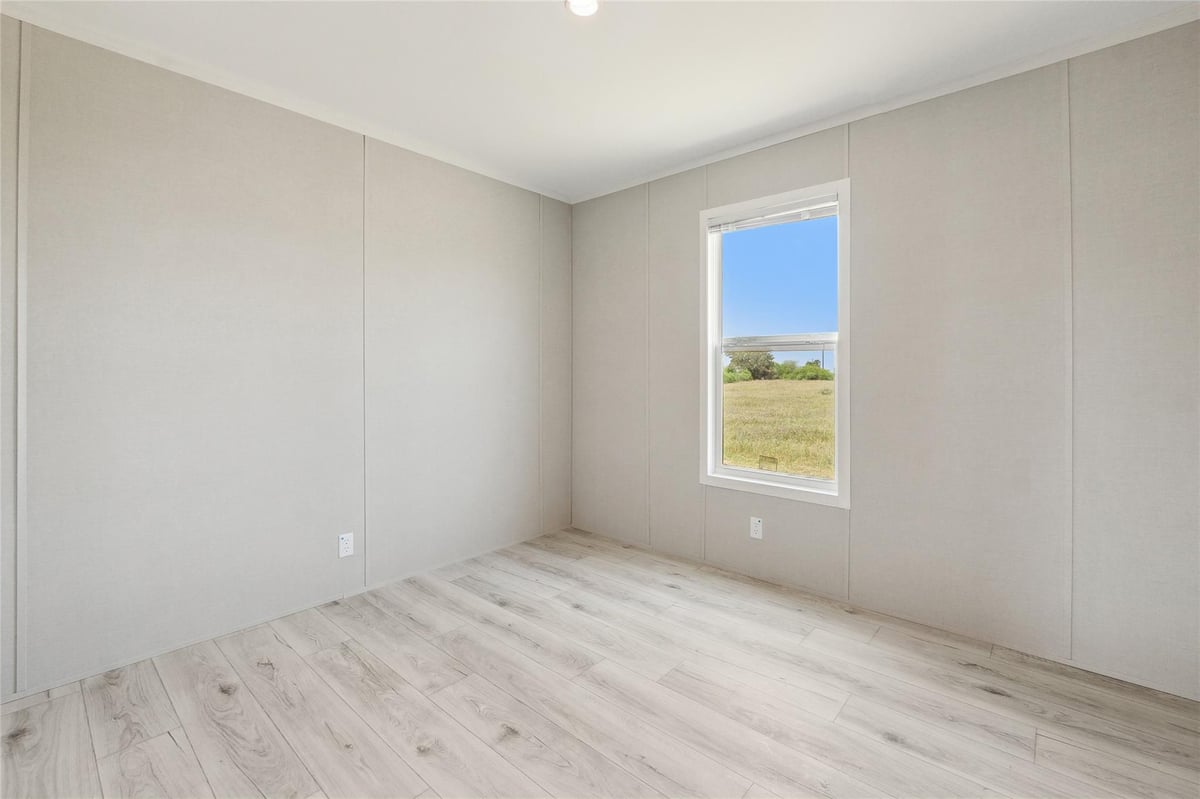 View 1287 CR 402 Rds Unit #Lot 17 in Aquila Acres 1287 CR 402 Rds Unit #Lot 17 - front exterior - Luxury home in Aquila Acres, Flatonia, TX