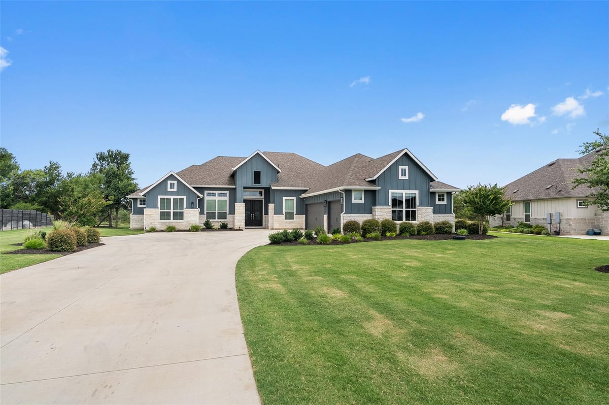 View 129 Hamilton BR in Northfork 129 Hamilton BR - front exterior - Luxury home in Northfork, Liberty Hill, TX