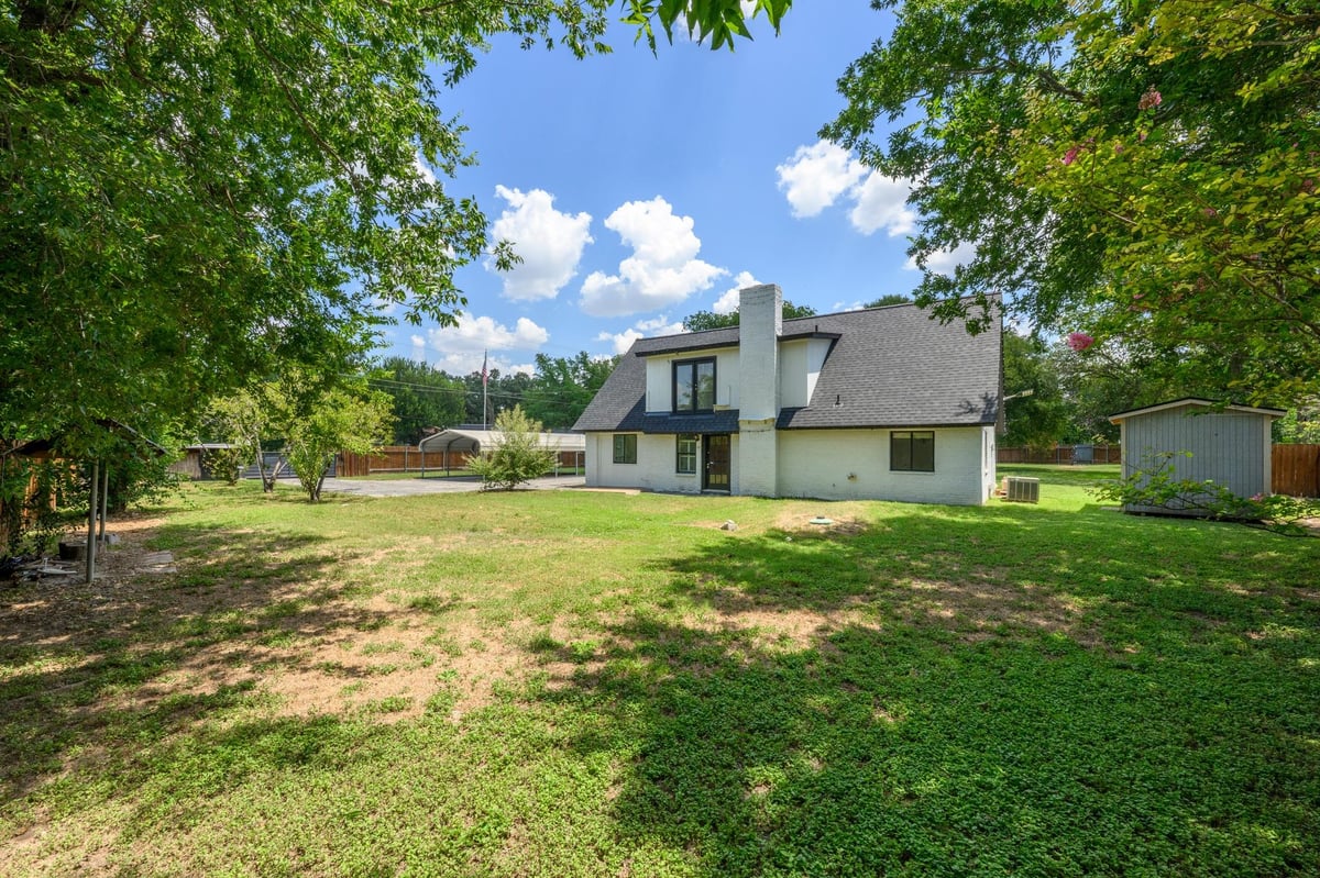 View 12900 Ben Milam DR in Onion Creek Meadows 12900 Ben Milam DR - property photo 1 - Luxury home in Onion Creek Meadows, Manchaca, TX