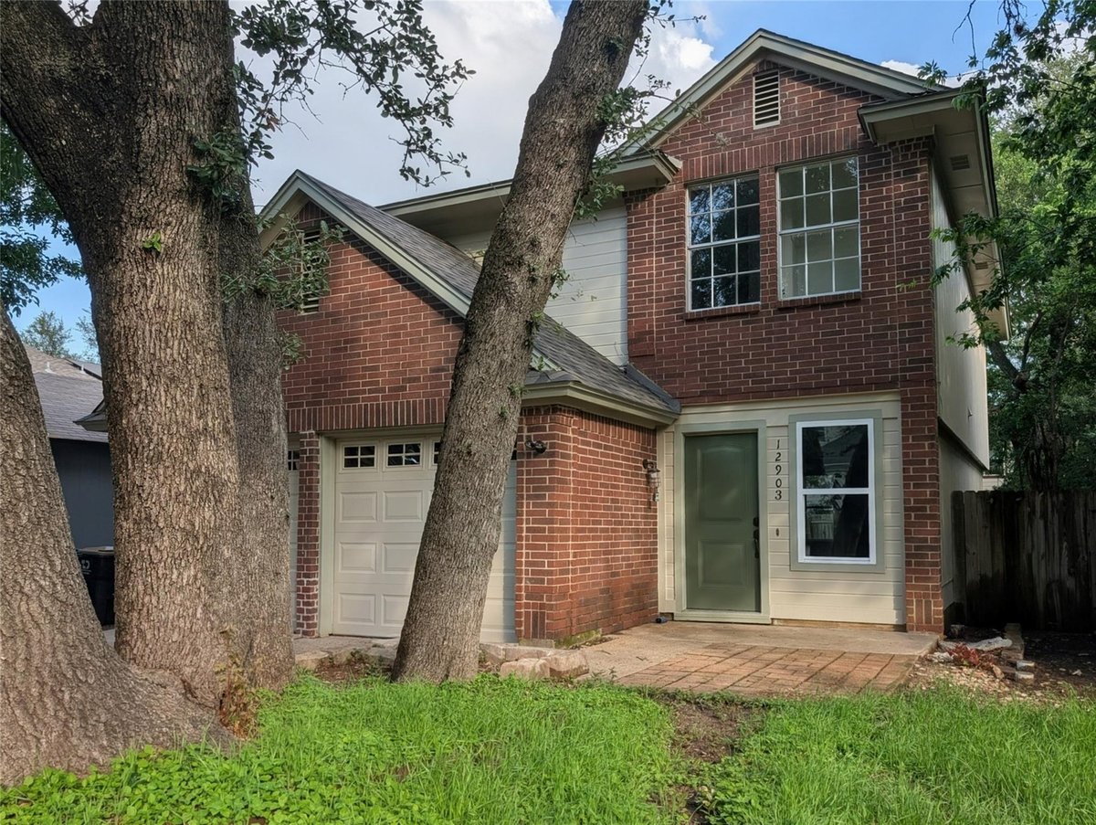 Primary bedroom at 12903 Steeple Chase Dr - 4 bed 2 bath home