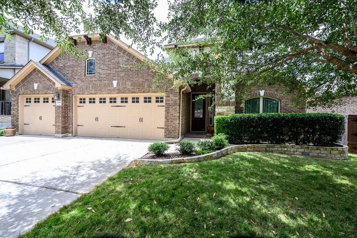 View 12904 Bismark DR in Bridges Of Bear Creek Ph 2 SE 12904 Bismark DR - front exterior - Luxury home in Bridges Of Bear Creek Ph 2 SE, Austin, TX