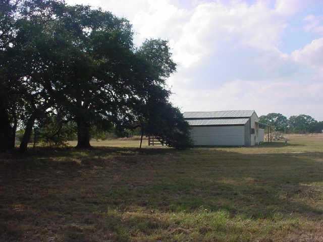 View 1293 Cedar Pass RD 1293 Cedar Pass RD - front exterior - Luxury lot in Driftwood, TX
