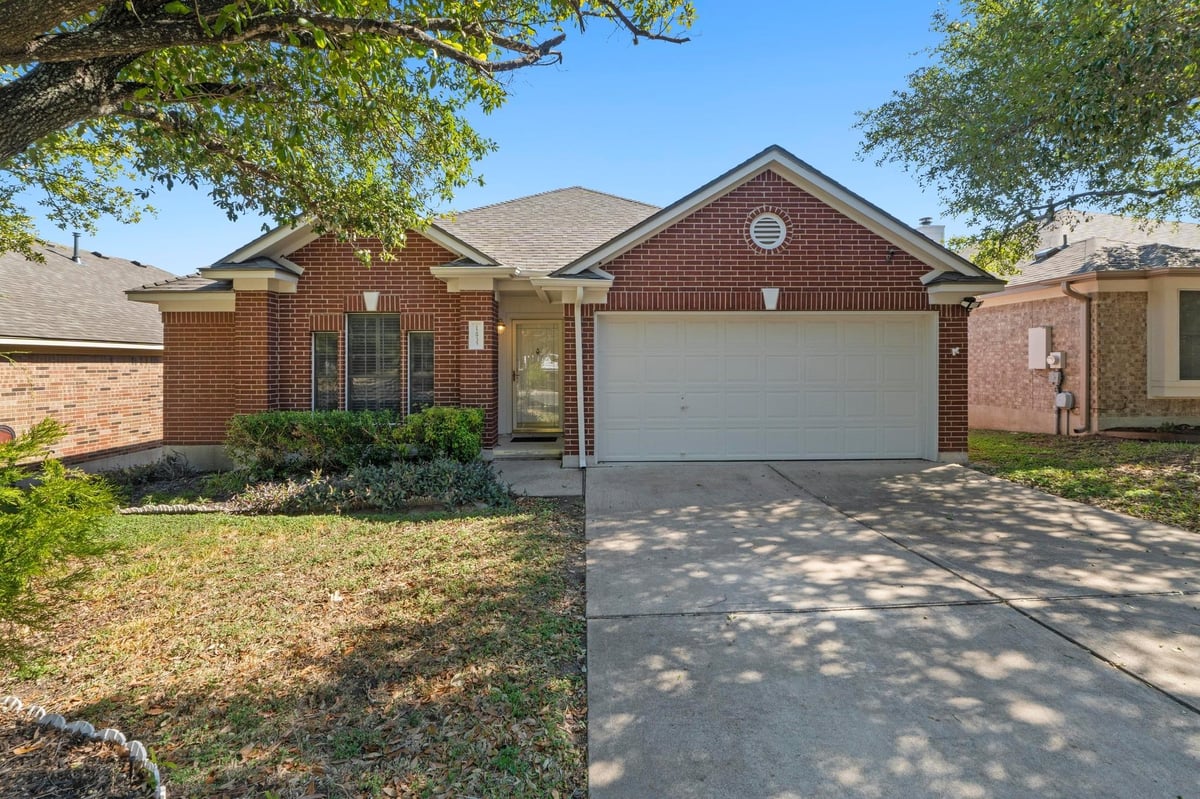 View 12935 Withers WAY in Scofield Ph 07 Sec 03-B 12935 Withers WAY - front exterior - Luxury home in Scofield Ph 07 Sec 03-B, Austin, TX