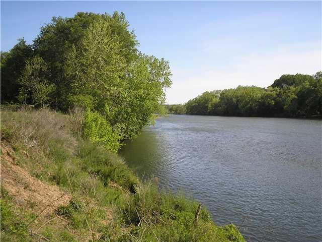 View 13.31B Acres Hidden Shores 13.31B Acres Hidden Shores - front exterior - Luxury home in Smithville, TX