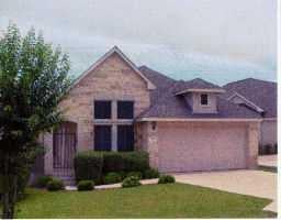 View 13 Muirfield Greens Ln in ST ANDREWS 13 Muirfield Greens Ln - front exterior - Luxury home in ST ANDREWS, Austin, TX