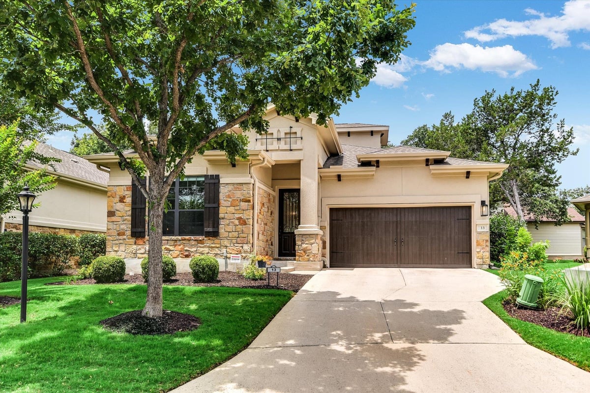 View 13 Prestonwood CIR in Boulevard At Lakeway 13 Prestonwood CIR - front exterior - Luxury home in Boulevard At Lakeway, Austin, TX