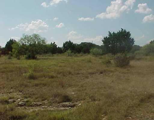 View 13 Wesley Ridge DR 13 Wesley Ridge DR - property photo 1 - Luxury lot in Spicewood, TX