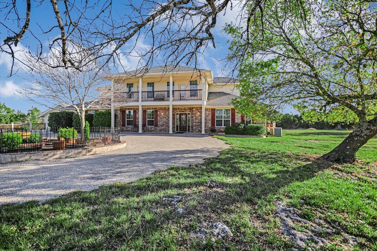 View 130 CAVE SPRINGS Rd in LOST SPRINGS 130 CAVE SPRINGS Rd - front exterior - Luxury home in LOST SPRINGS, Wimberley, TX