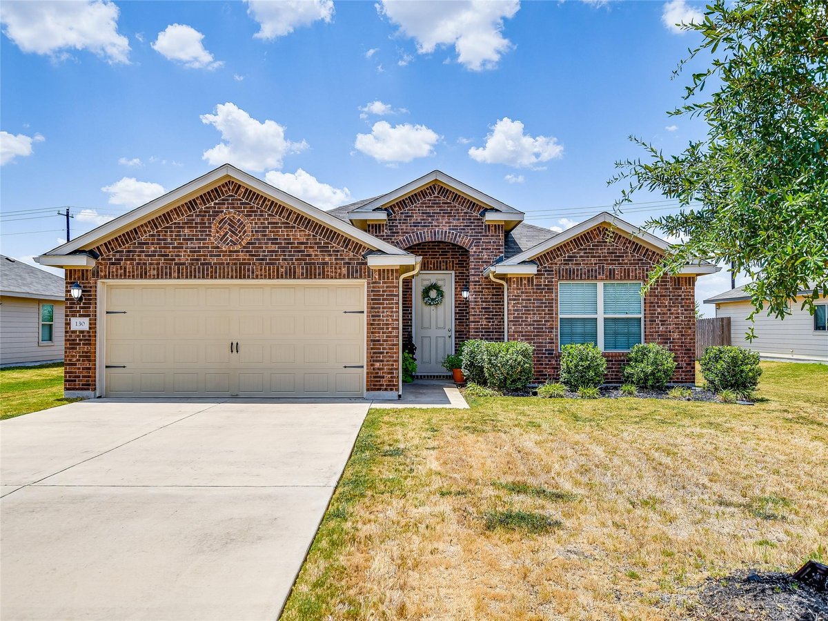 View 130 Sunshine Ln in Woodlands Park Ph 3 130 Sunshine Ln - front exterior - Luxury home in Woodlands Park Ph 3, Kyle, TX