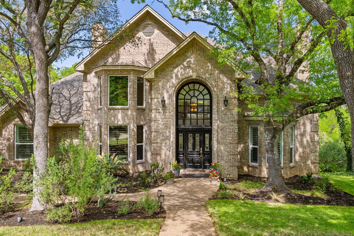 View 1300 Puddleby CV in Treemont Ph A Sec 01 1300 Puddleby CV - front exterior - Luxury home in Treemont Ph A Sec 01, Austin, TX