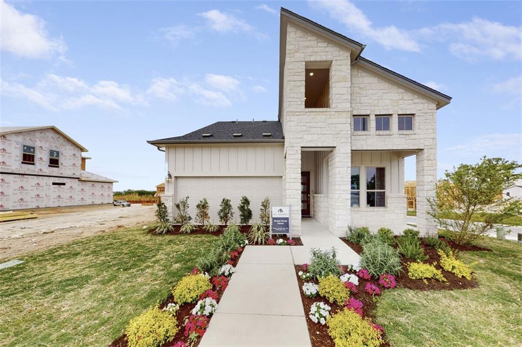 View 13000 Bloomington Dr in Hills of Estancia 13000 Bloomington Dr - front exterior - Luxury home in Hills of Estancia, Austin, TX