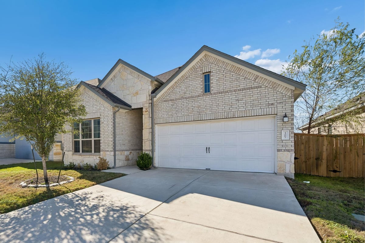 13002 Stanford DR - front exterior - Luxury home in HILLS AT ESTANCIA CONDOMINIUMS, Austin, TX
