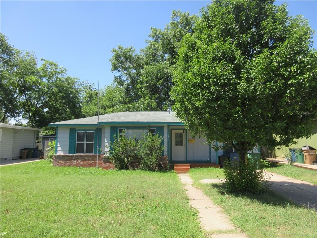 View 1301 Aggie Ln in Crestview Add Sec 08 1301 Aggie Ln - front exterior - Luxury home in Crestview Add Sec 08, Austin, TX
