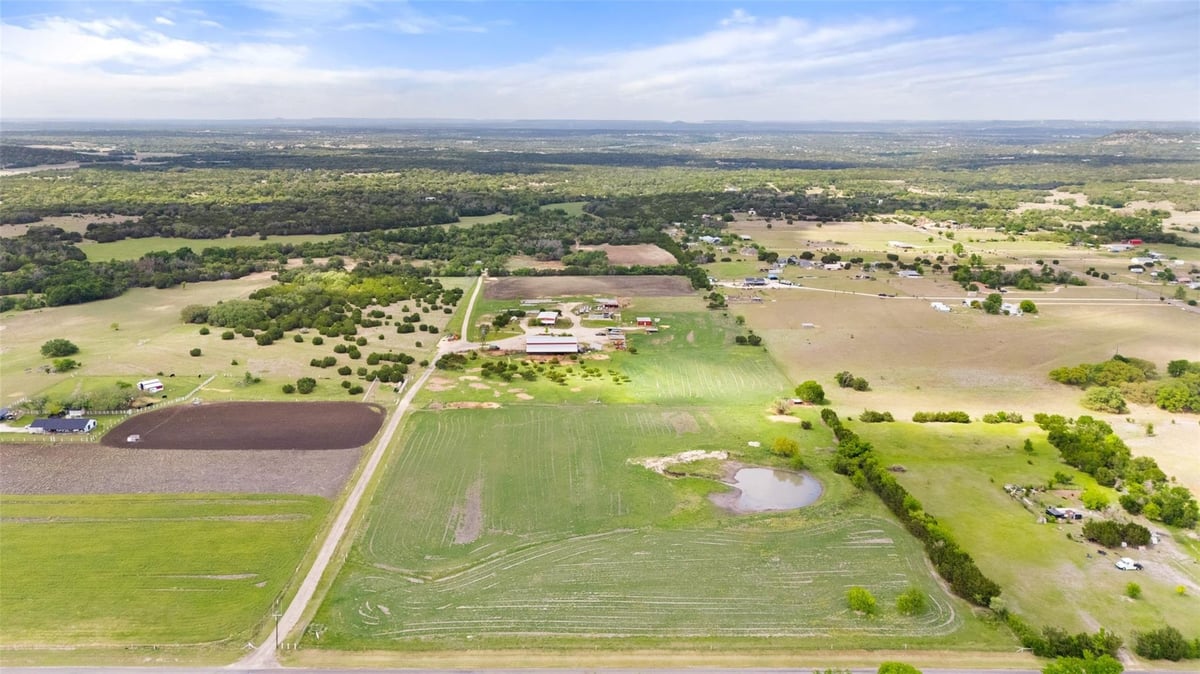View 1301 County Road 228 in Chambers Sub 1301 County Road 228 - front exterior - Luxury home in Chambers Sub, Florence, TX