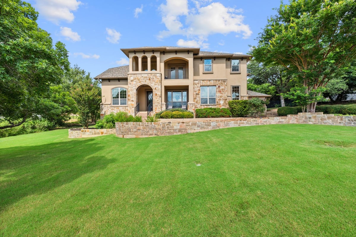 View 1301 Lions Lair in Grand Mesa At Crystal Falls 1301 Lions Lair - front exterior - Luxury home in Grand Mesa At Crystal Falls, Leander, TX