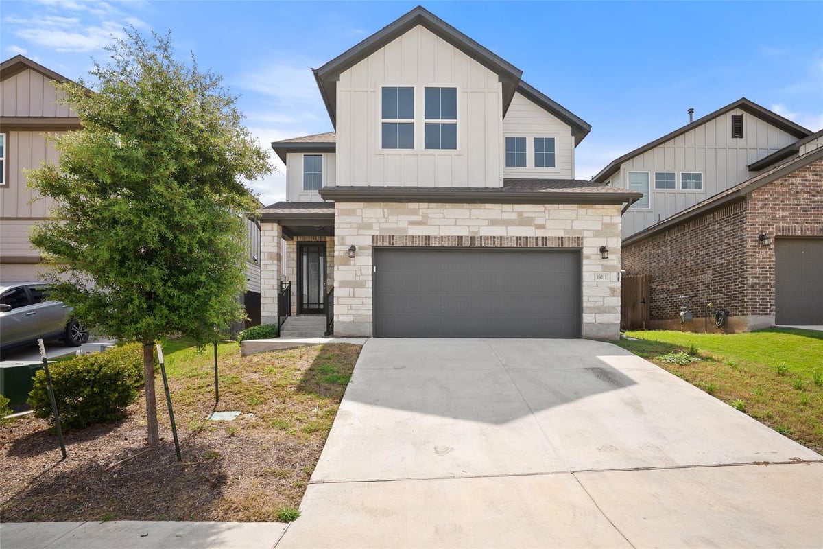 View 13011 Brave Tenderfoot TRL in Turners Xing North Ph 1 13011 Brave Tenderfoot TRL - property photo 1 - Luxury home in Turners Xing North Ph 1, Buda, TX