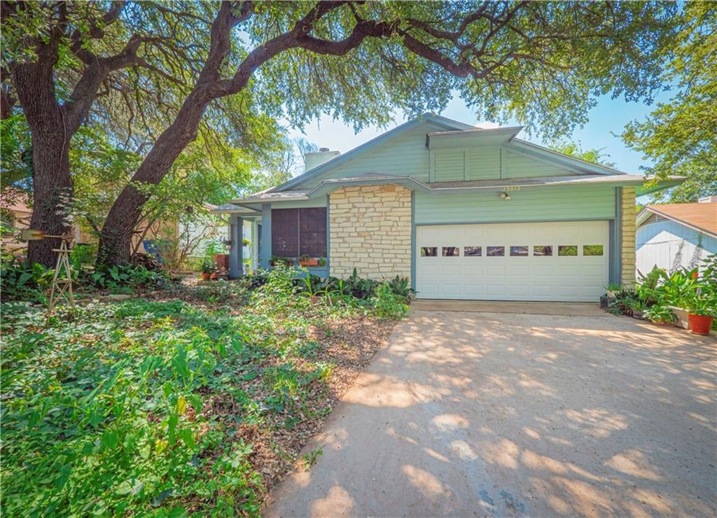 View 13012 Garfield Ln in Milwood Sec 16 13012 Garfield Ln - front exterior - Luxury home in Milwood Sec 16, Austin, TX