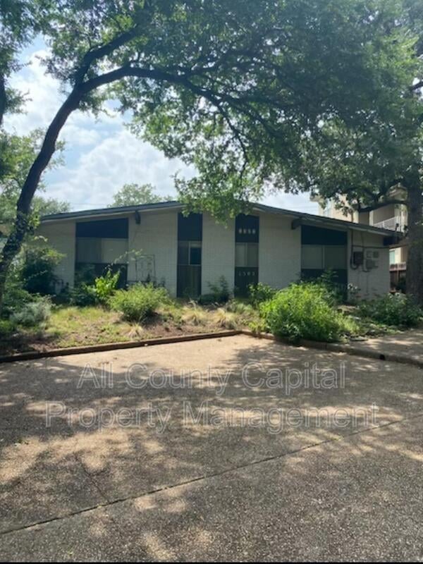 1302 Norwalk LN Unit #1 - property photo 1 - Luxury home in West Austin Tanglewood Condo, Austin, TX