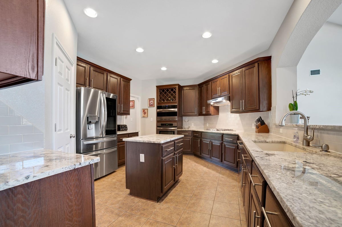 Primary bedroom at 13026  Titus Ct - 5 bed 3 bath home