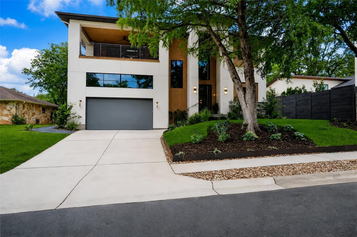 View 1304 Dusky Thrush TRL in Woodhaven 1304 Dusky Thrush TRL - front exterior - Luxury home in Woodhaven, Austin, TX
