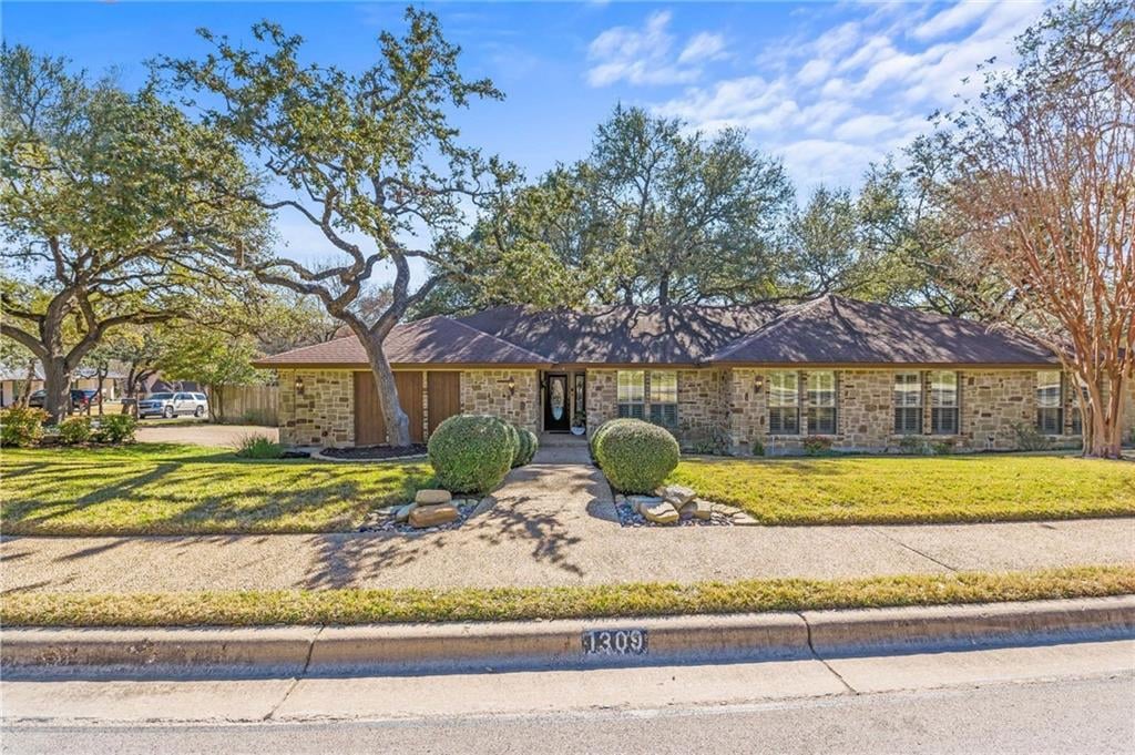 View 1309 Wilderness DR in Beecave Woods Sec 02 1309 Wilderness DR - front exterior - Luxury home in Beecave Woods Sec 02, Austin, TX