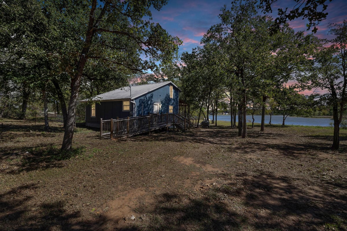 View 131 Moccasin Bend Dr in Lake Thunderbird 131 Moccasin Bend Dr - front exterior - Luxury home in Lake Thunderbird, Smithville, TX