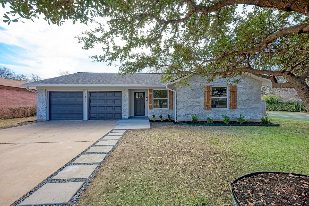 View 1311 Meadgreen DR in Village At Quail Creek Sec 02 1311 Meadgreen DR - front exterior - Luxury home in Village At Quail Creek Sec 02, Austin, TX