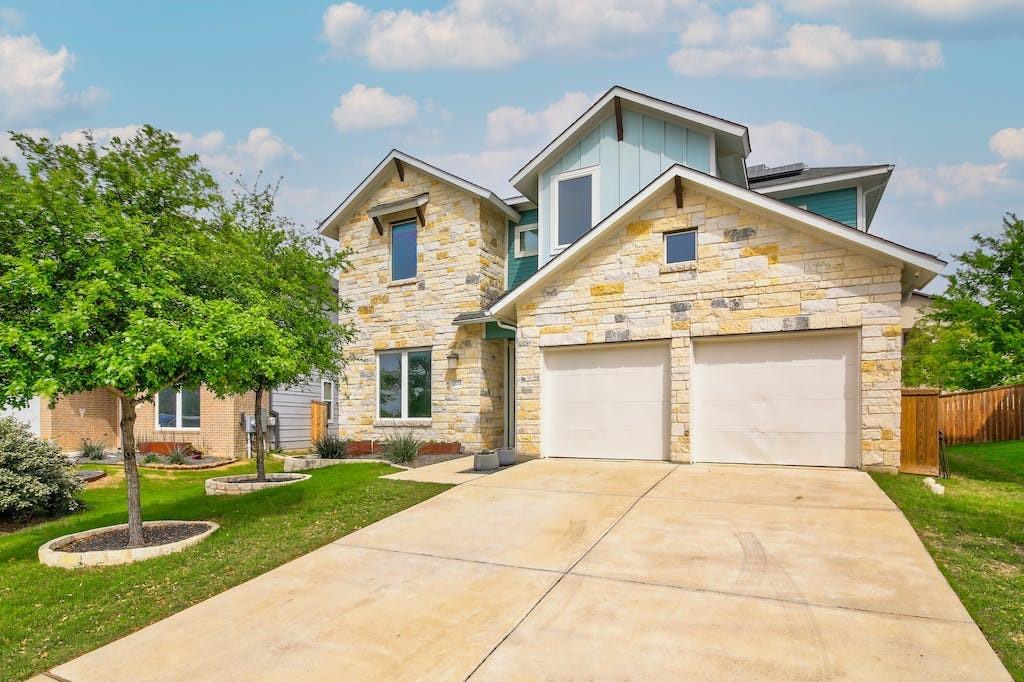 View 13114 Armaga Springs Rd in Scofield Farms Ph 3 Sec 2 13114 Armaga Springs Rd - front exterior - Luxury home in Scofield Farms Ph 3 Sec 2, Austin, TX