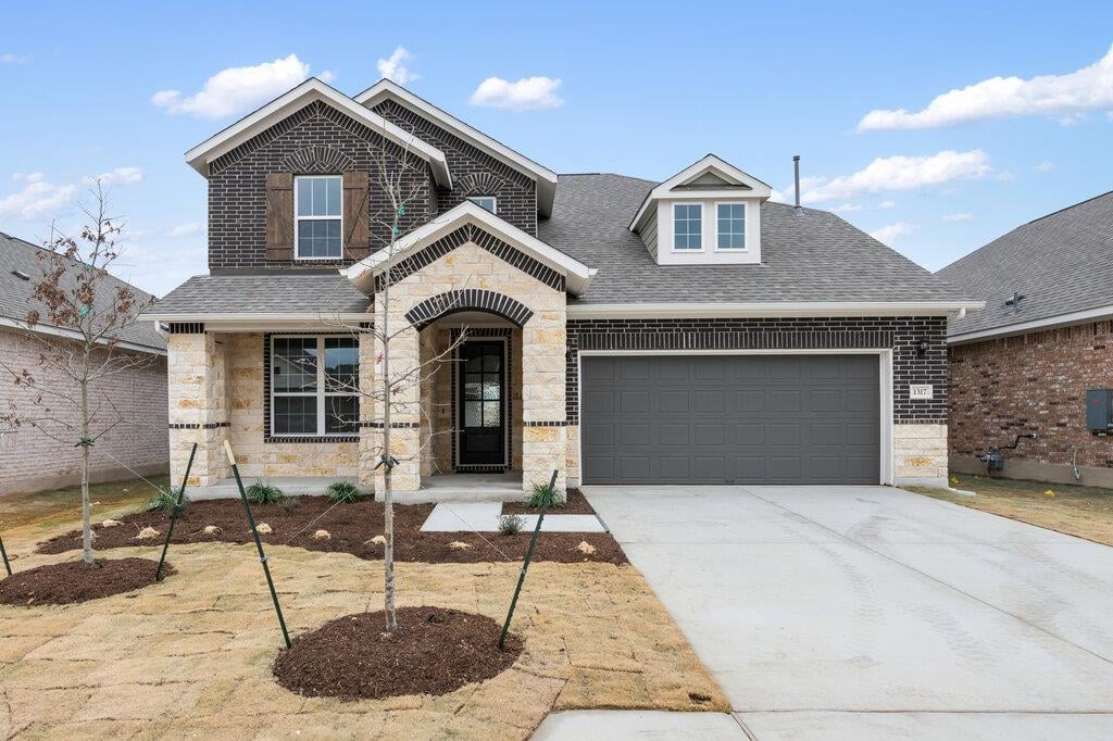 View 1317 Dog Iron St in Berry Creek Highlands 1317 Dog Iron St - front exterior - Luxury home in Berry Creek Highlands, Georgetown, TX
