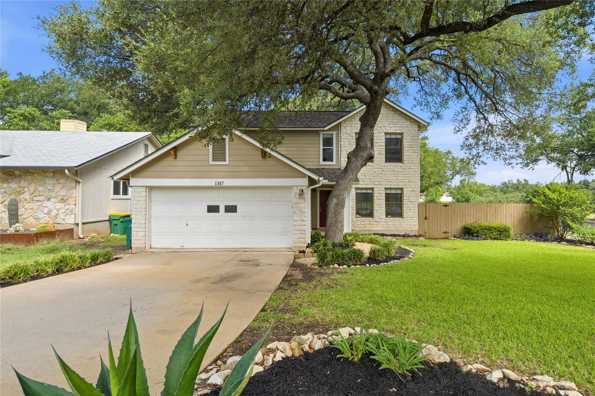 View 1317 Mimosa PASS in Anderson Mill West Sec 01 1317 Mimosa PASS - front exterior - Luxury home in Anderson Mill West Sec 01, Cedar Park, TX