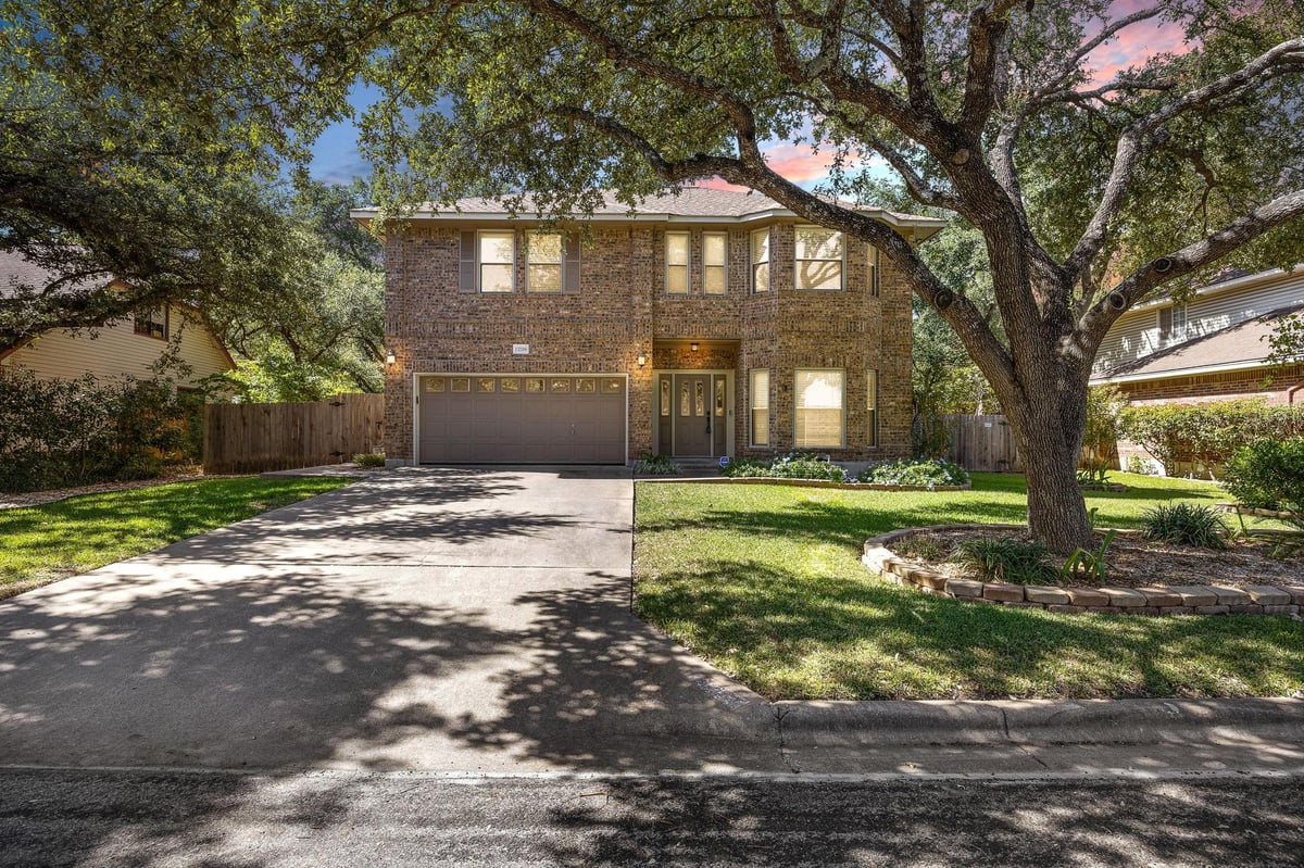 View 13206 Adonis Dr in Springwoods Sec 02G 13206 Adonis Dr - front exterior - Luxury home in Springwoods Sec 02G, Austin, TX