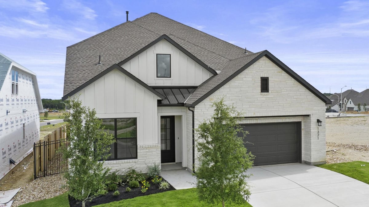 View 1321 White Mistflower DR in Wildspring - Arbor Collection 1321 White Mistflower DR - front exterior - Luxury home in Wildspring - Arbor Collection, Leander, TX
