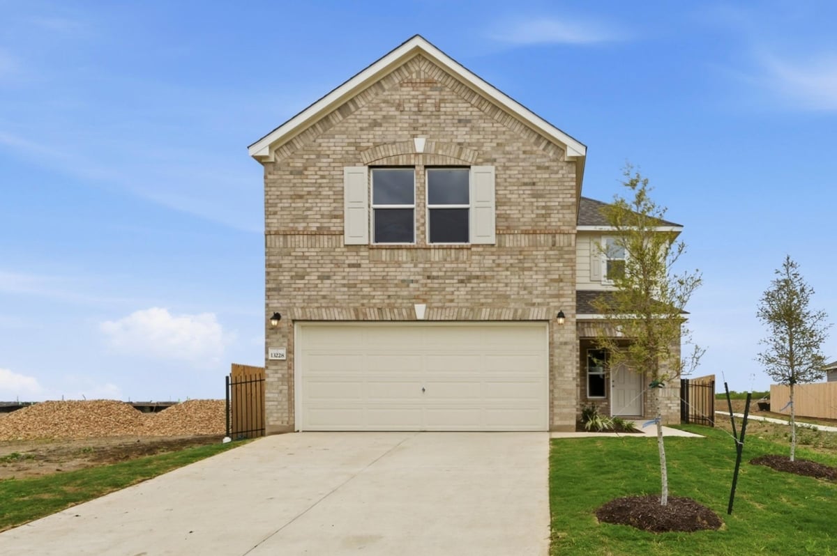 View 13228 Kincane Dr in Stoney Chase 13228 Kincane Dr - front exterior - Luxury home in Stoney Chase, Del Valle, TX