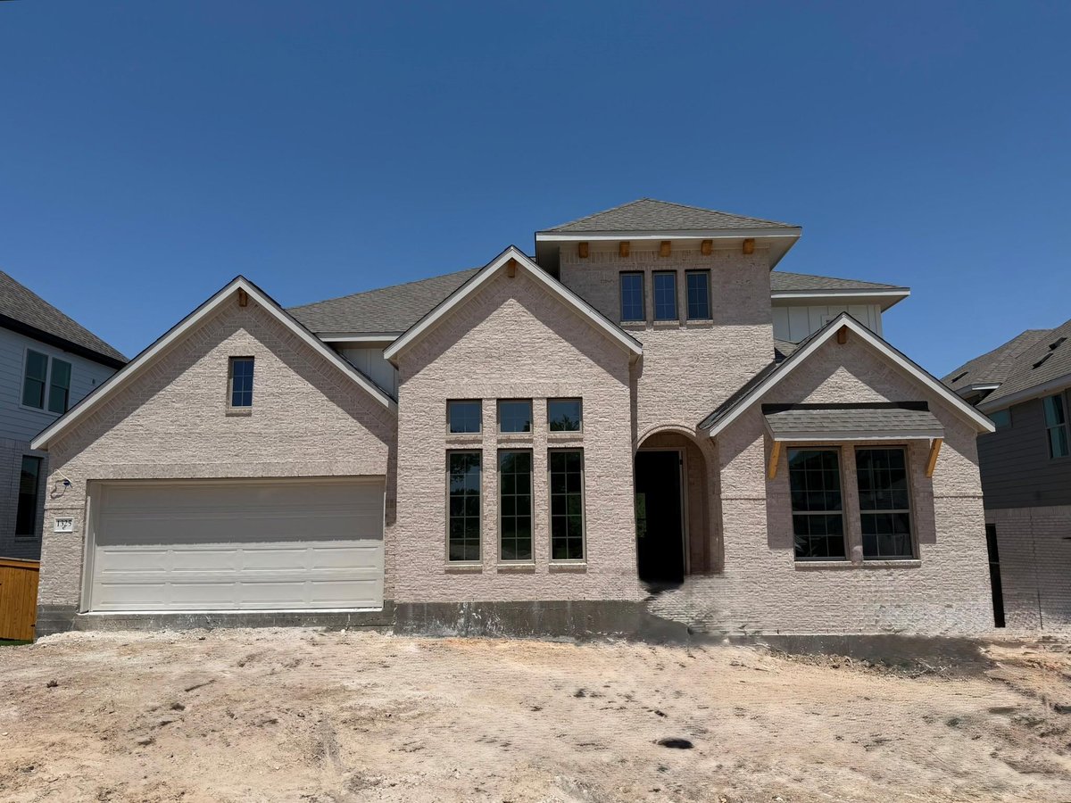 1325 White Daisy Ln - front exterior - Luxury home in Parkside on the River, Georgetown, TX