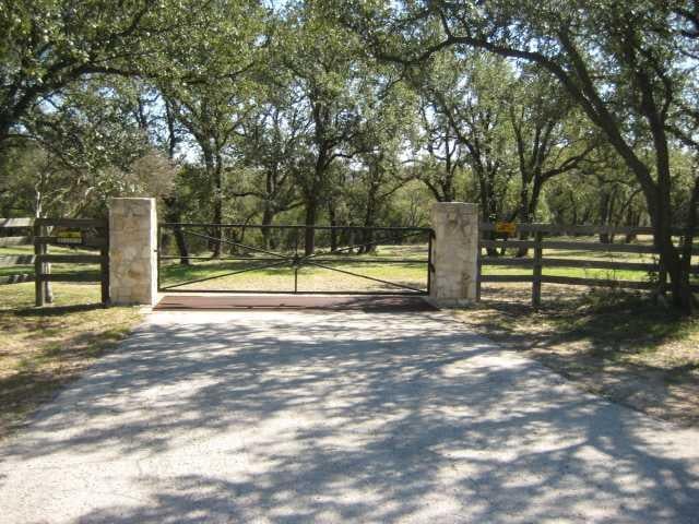 View 1326 County Road 414 1326 County Road 414 - front exterior - Luxury home in Spicewood, TX