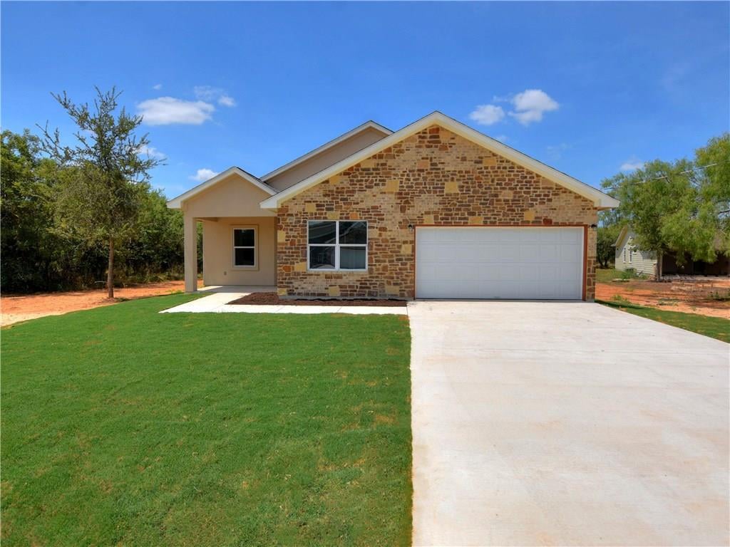 View 133 Naalehu CT 133 Naalehu CT - front exterior - Luxury home in Bastrop, TX