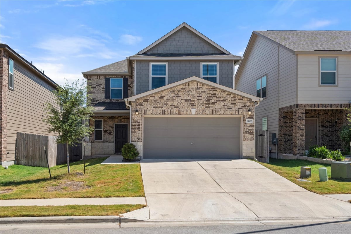 View 13300 Betty Ford ST in Presidential Mdws Sec 18 13300 Betty Ford ST - front exterior - Luxury home in Presidential Mdws Sec 18, Manor, TX