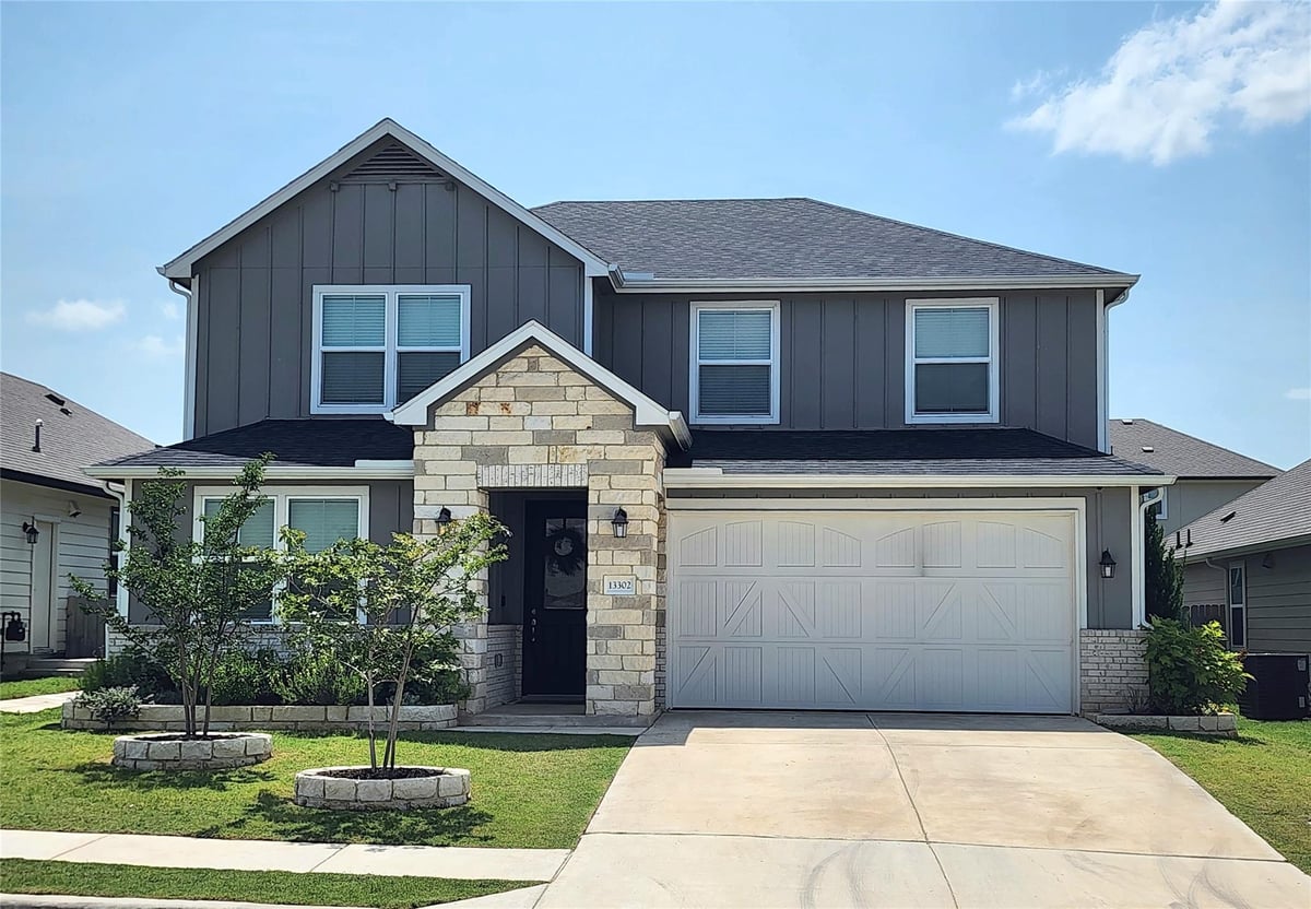 13302 Henrietta PLZ - front exterior - Luxury home in Manor Heights Ph 2 Sec 1a, Manor, TX