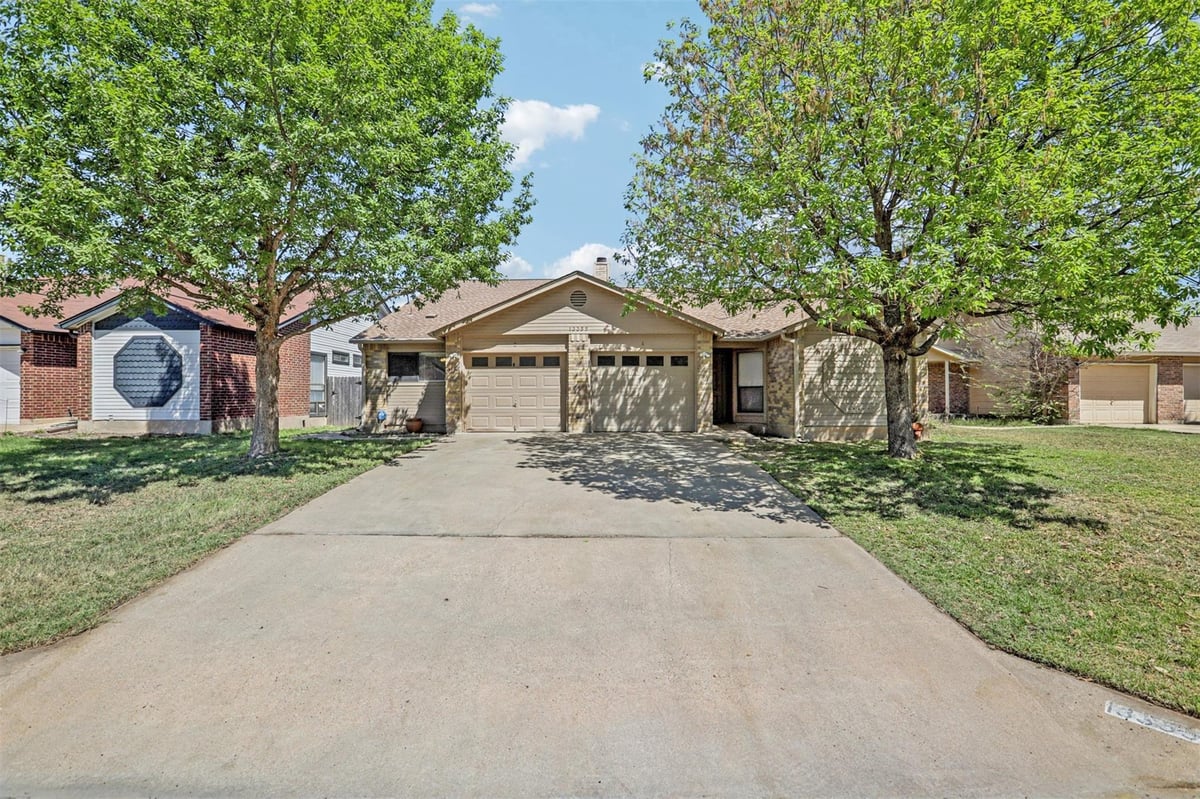 View 13355 Water Oak Ln in Clear Creek Add 13355 Water Oak Ln - front exterior - Luxury home in Clear Creek Add, Austin, TX