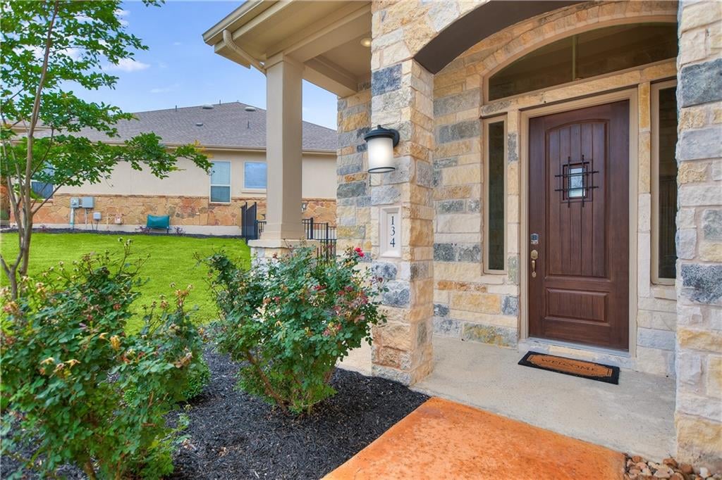 View 134 Cartwheel Bnd in Rough Hollow 134 Cartwheel Bnd - front exterior - Luxury home in Rough Hollow, Austin, TX