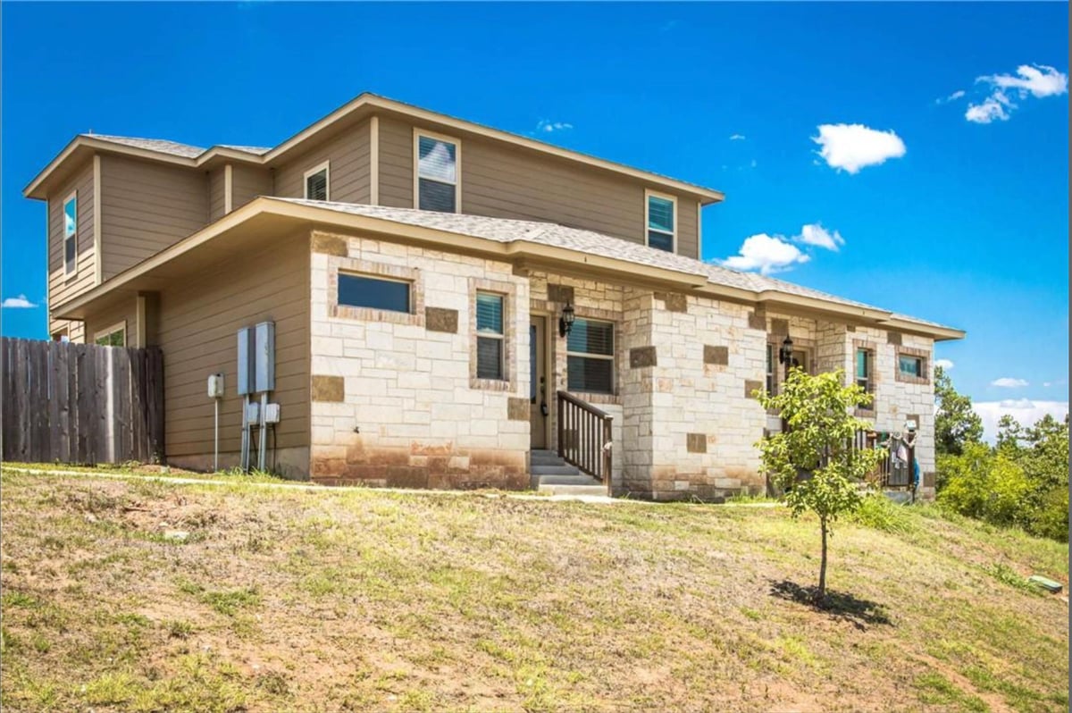 View 134 Honopu Dr in Tahitian Village, 134 Honopu Dr - front exterior - Luxury home in Tahitian Village,, Bastrop, TX