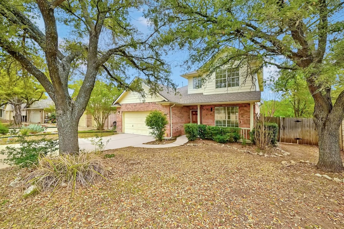 View 13401 Lamplight Village Ave in Scofield Farms Ph 08 Sec 03 13401 Lamplight Village Ave - front exterior - Luxury home in Scofield Farms Ph 08 Sec 03, Austin, TX