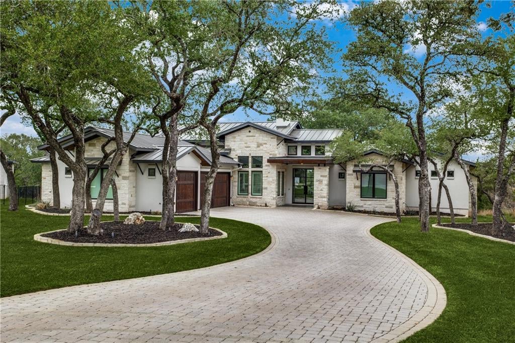 View 13432 Meridian Park Blvd in Meridian Sec F 13432 Meridian Park Blvd - front exterior - Luxury home in Meridian Sec F, Austin, TX