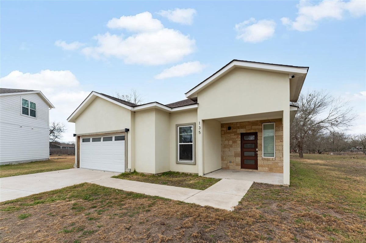 View 135 Koele Ct in Tahitian Village 135 Koele Ct - front exterior - Luxury home in Tahitian Village, Bastrop, TX