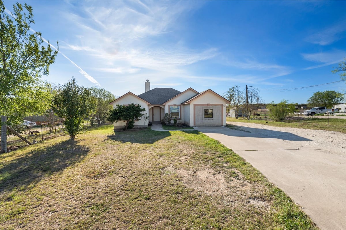 View 135 Petirrojo CT in Cielo Vista Ranch 135 Petirrojo CT - front exterior - Luxury home in Cielo Vista Ranch, Del Valle, TX