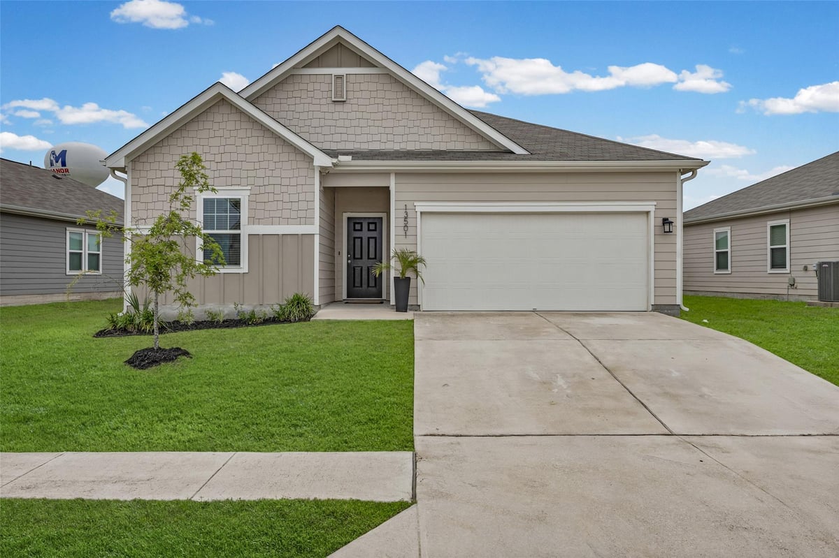 13501 Arthur Vandenburg WAY - front exterior - Luxury home in Presidential Heights, Manor, TX