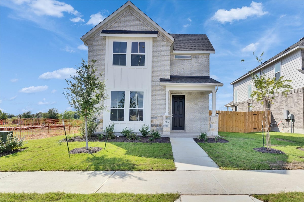 View 13504 Muny Pkwy in Creeks Crossing 13504 Muny Pkwy - front exterior - Luxury home in Creeks Crossing, Elgin, TX